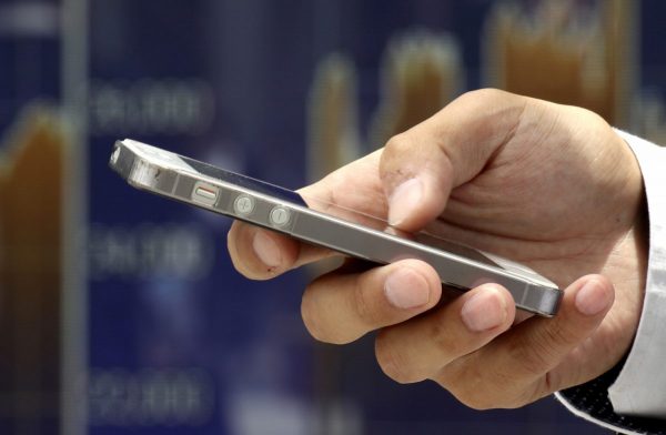a man holding a smartphone