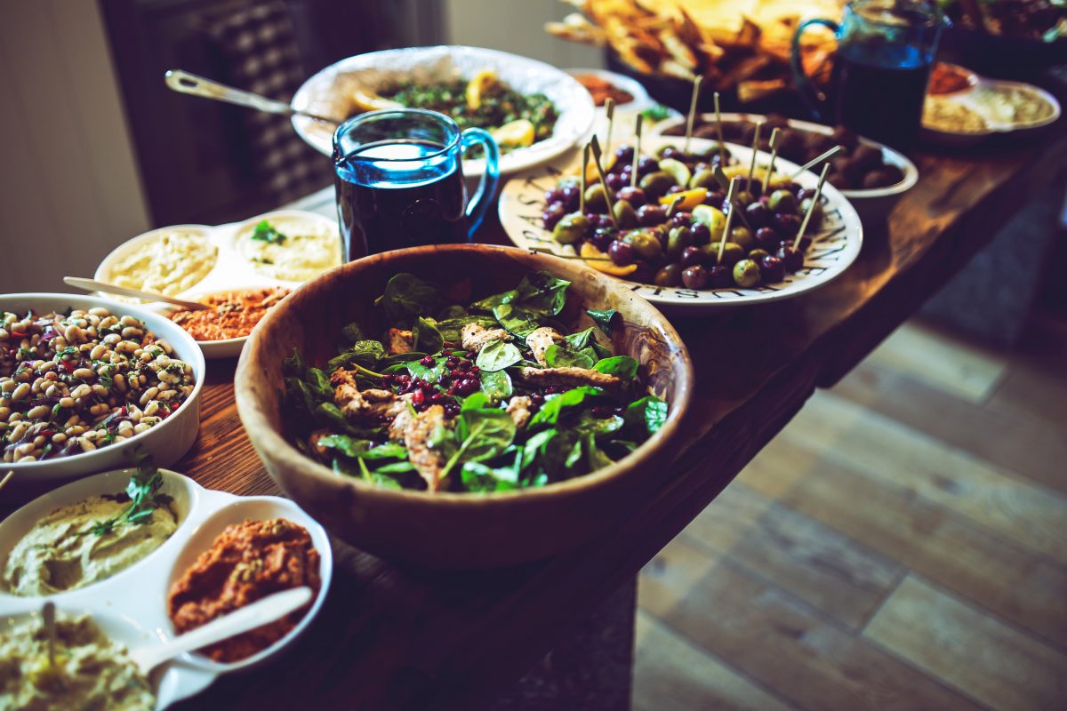 Salads, nuts, and whole foods are a delicious way to keep tryglyceride levels in check. (Kaboompics/Pexels)