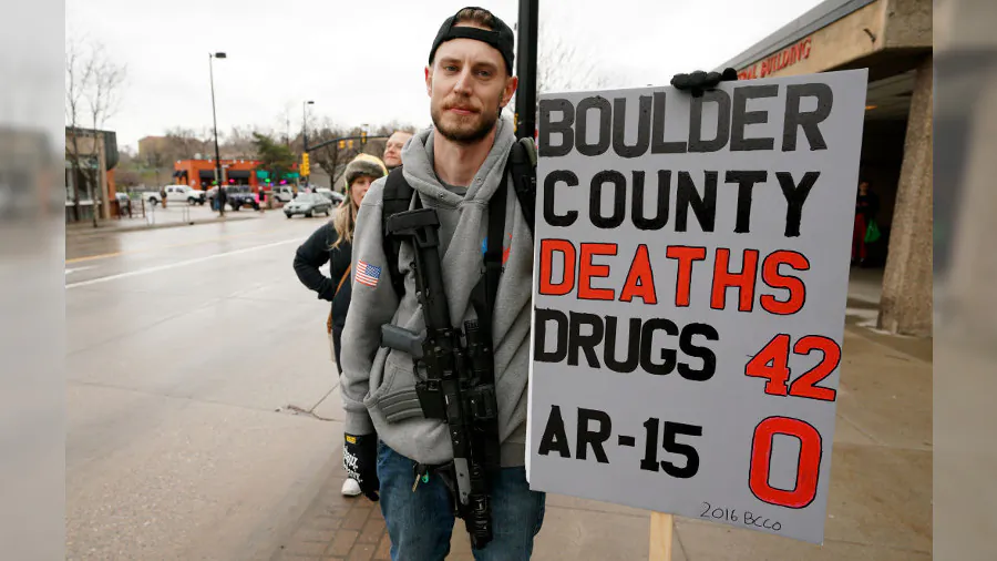 A man who didn't want to be identified at a protest against the looming gun ban in Boulder, Co., on April 21, 2018. (Rick T. Wilking/Getty Images)