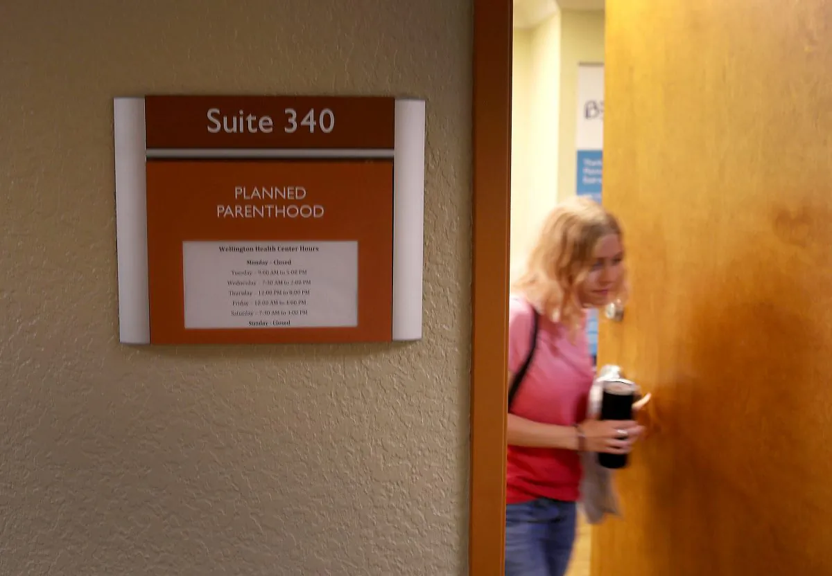 A woman leaves a Planned Parenthood clinic in Wellington, Florida, on April 14, 2017. (Joe Raedle/Getty Images)
