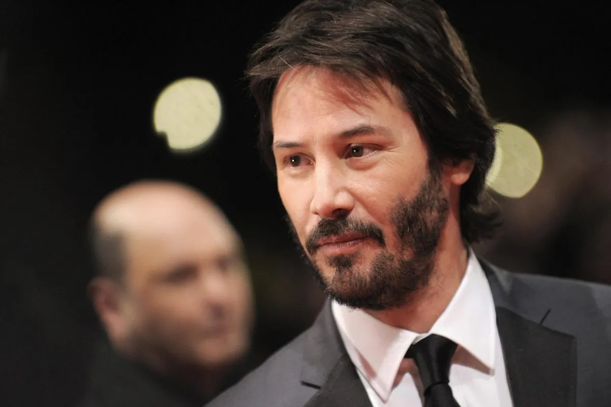 US actor Keanu Reeves poses for photographers on the red carpet ahead of the premiere of the film "The Private Lives of Pippa Lee" in Berlin, Feb. 9, 2009. (Axel Schmidt/AFP/Getty Images)