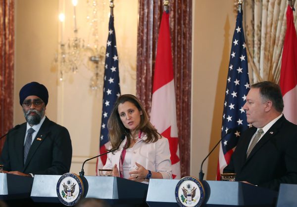 (L-R) Canadian Minister of National Defence Harjit Sajjan, U.S. Secretary of State Mike Pompeo , and Canadian Minister of Foreign Affairs Chrystia Freeland at a press conference on Dec. 14, 2018 in Washington. (Mark Wilson/Getty Images)
