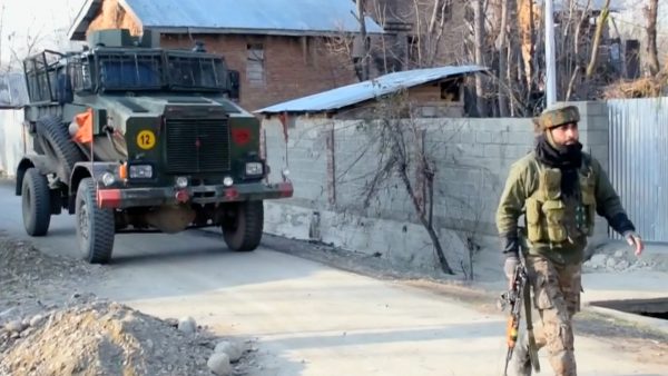 Soldiers in armored vehincle