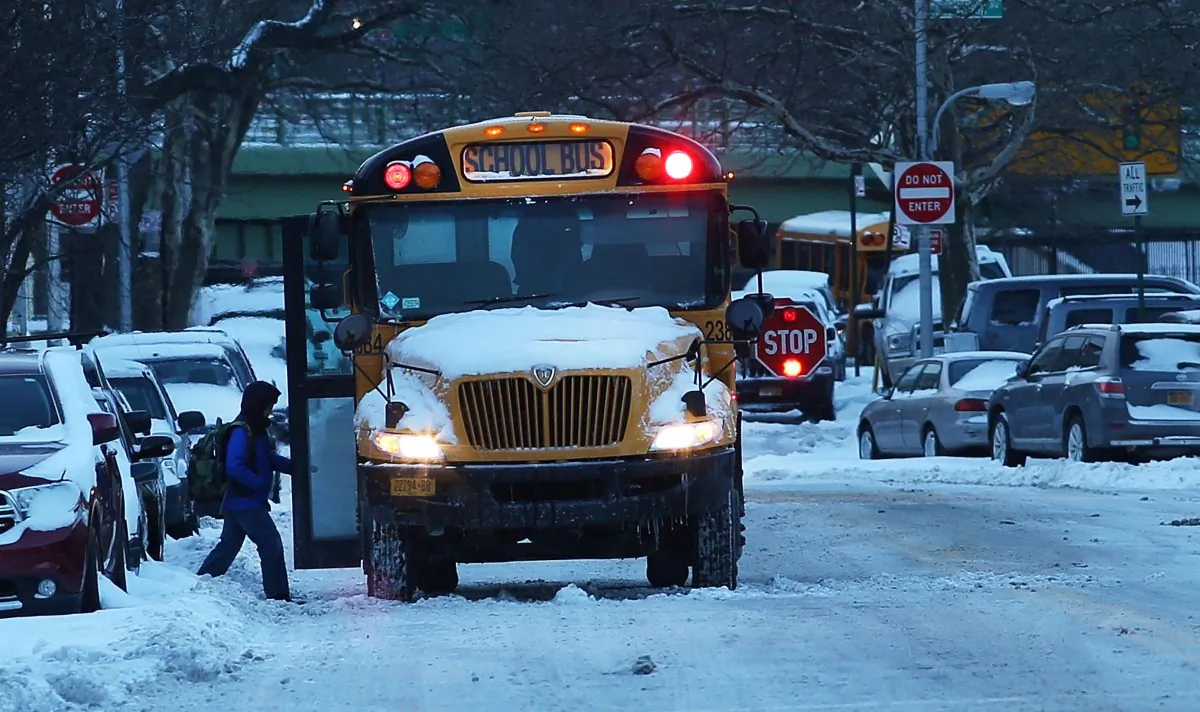 A school bus picks up children in New York City on Jan. 22, 2014. (Spencer Platt/Getty Images)