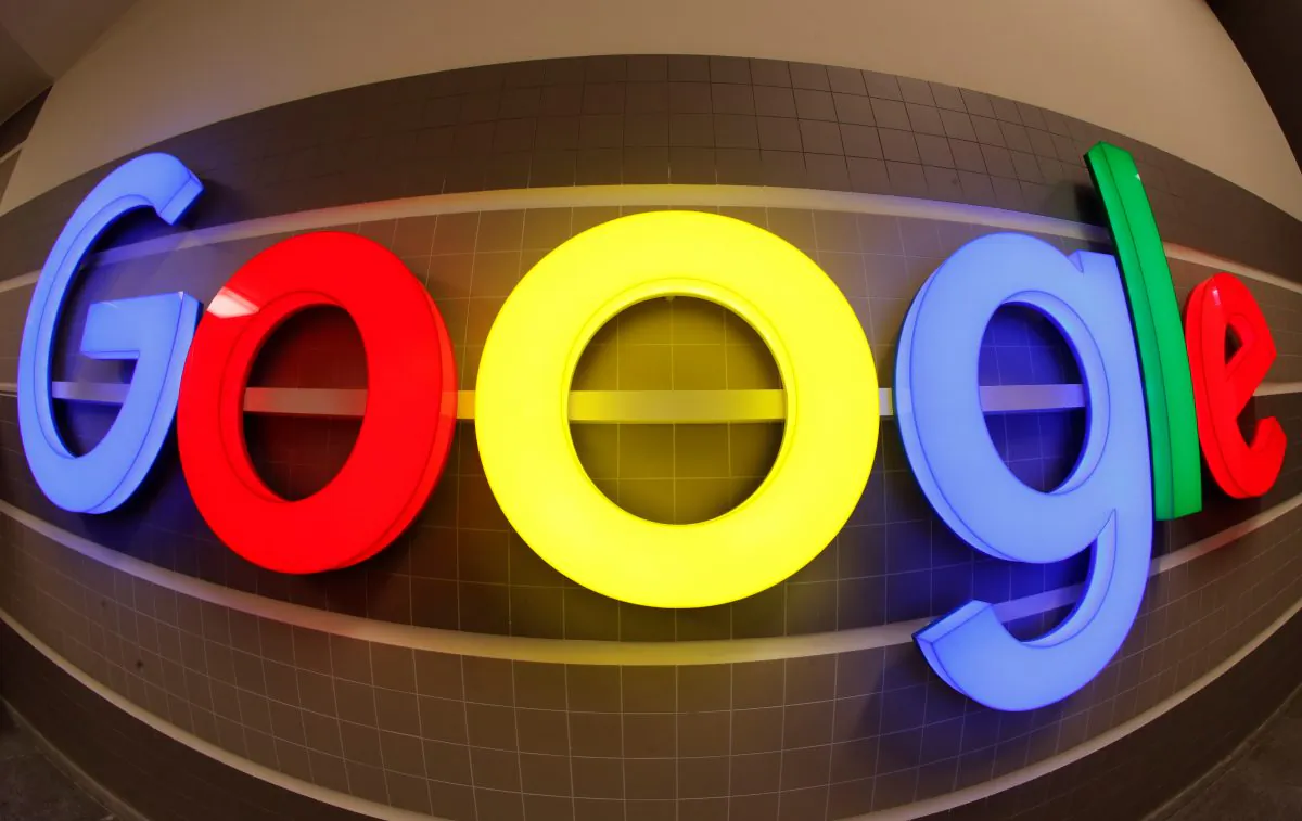 An illuminated Google logo is seen inside an office building in Zurich, Switzerland December 5, 2018. Picture taken with a fisheye lens. (Arnd Wiegmann/Reuters)