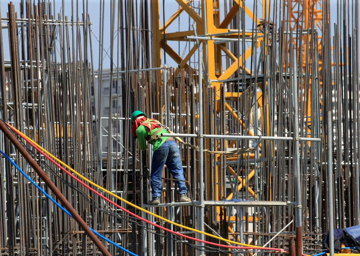 A worker installs steel rods at a construction site in Paranaque city, metro Manila, Philippines, on May 29, 2018. (Romeo Ranoco/Reuters)