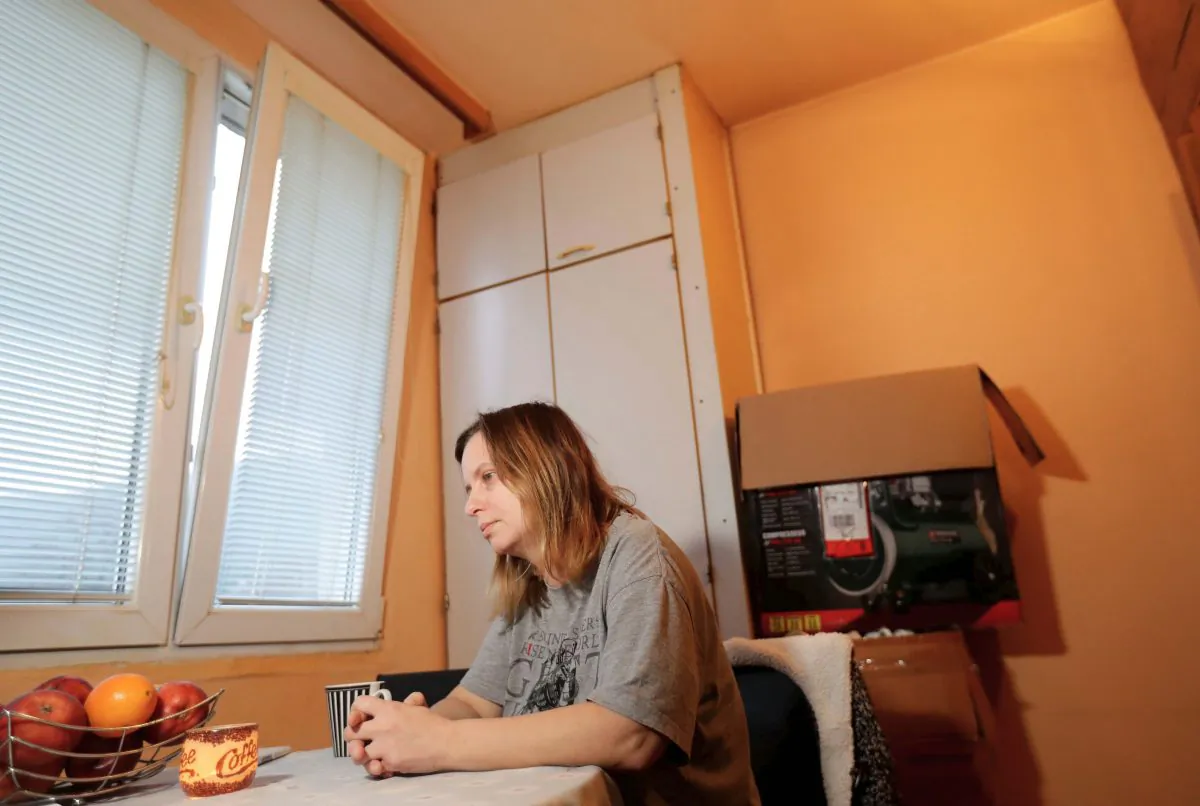 Ludmila Krivkova, 42, owes 850,000 crowns from 14 loans taken out over five years. She is pictured here in her apartment in Usti nad Labem, Czech Republic, on Nov. 22, 2018. (Reuters/David W Cerny)