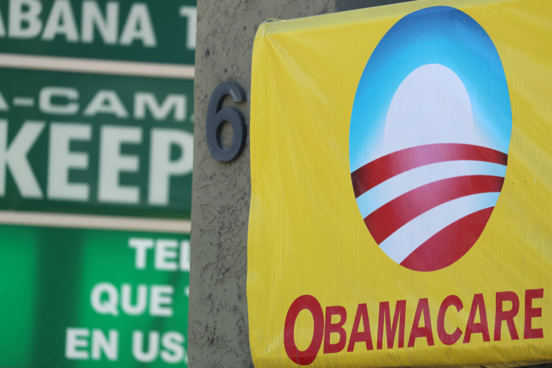 A sign on an insurance store advertises Obamacare in San Ysidro, San Diego, California, U.S., October 26, 2017. (Mike Blake/Reuters)