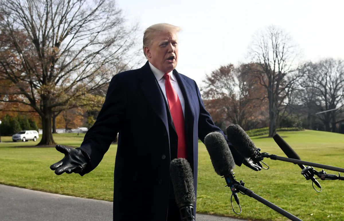 President Donald Trump answers questions from the press while departing the White House on Dec. 8, 2018. (Olivier Douliery-Pool/Getty Images)