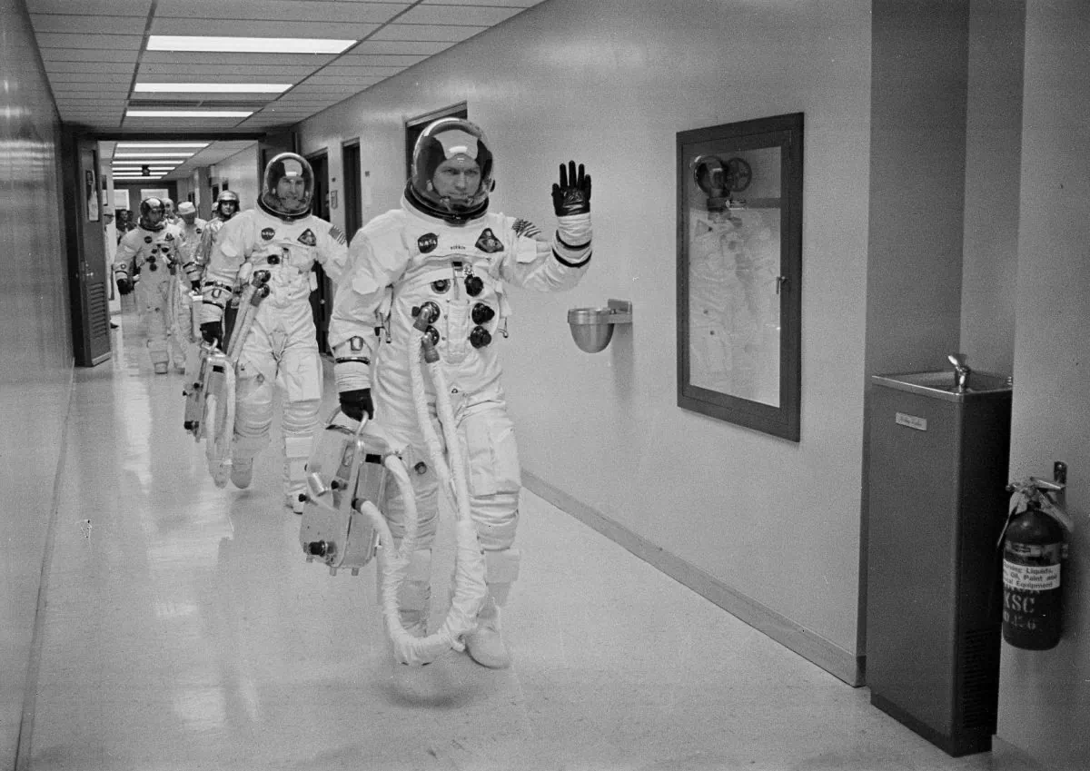 Apollo 8 Commander Col. Frank Borman leads the way as he and fellow astronauts Command Module Pilot Capt. James A. Lovell Jr. and Lunar Module Pilot Maj. William A. Anders head to the launch pad at the Kennedy Space Center in Florida, on Dec 21, 1968. (NASA/AP)