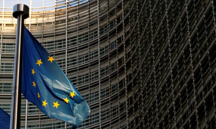 A European Union flag is seen outside the EU Commission headquarters in Brussels, Belgium, on Nov. 14, 2018.  (Reuters/Francois Lenoir)