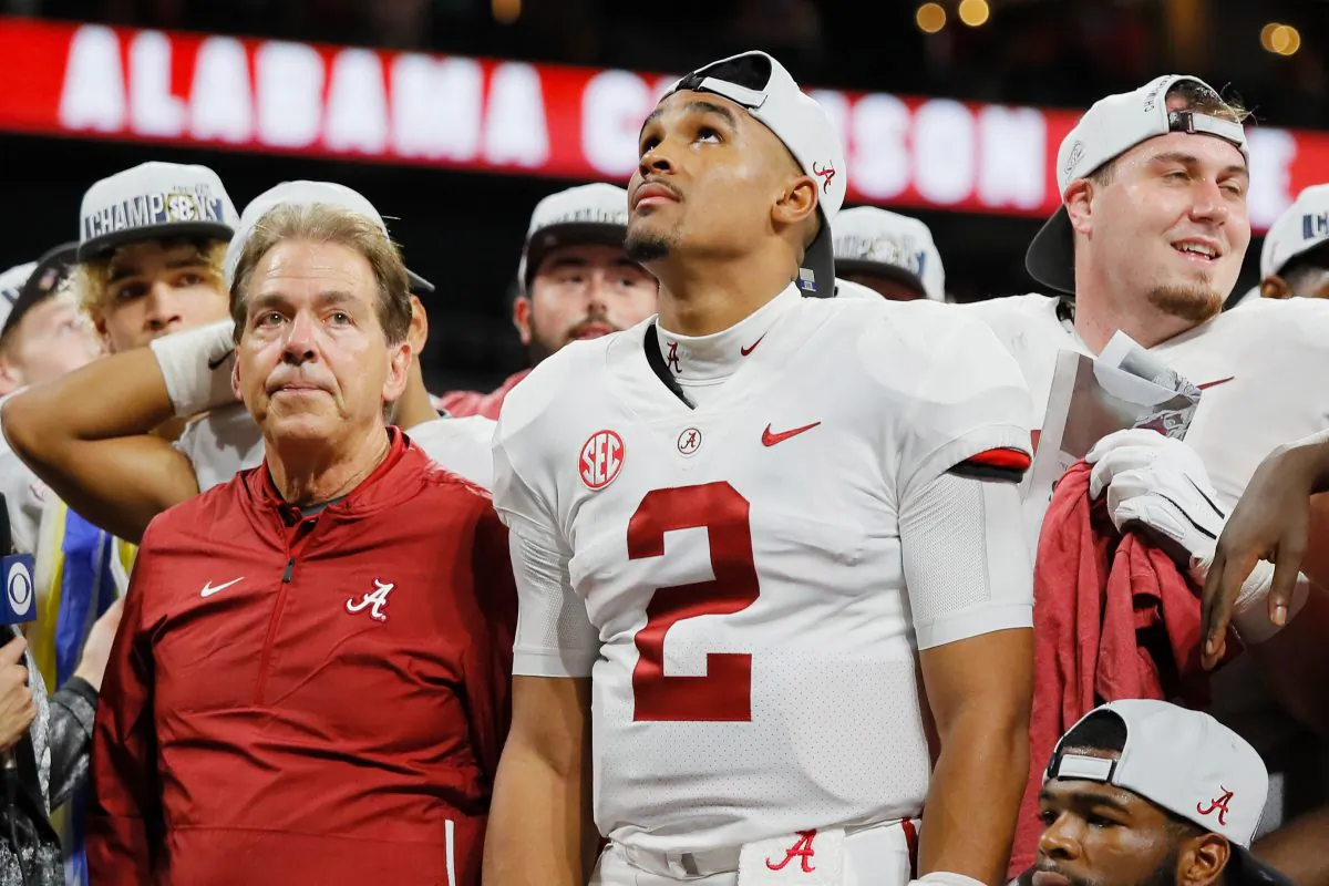 Head coach Nick Saban of the Alabama Crimson Tide and Jalen Hurts #2 react after defeating the Georgia Bulldogs 35–28 in the 2018 SEC Championship Game at Mercedes-Benz Stadium on Dec. 1, 2018, in Atlanta, Georgia. (C. Cox/Getty Images)