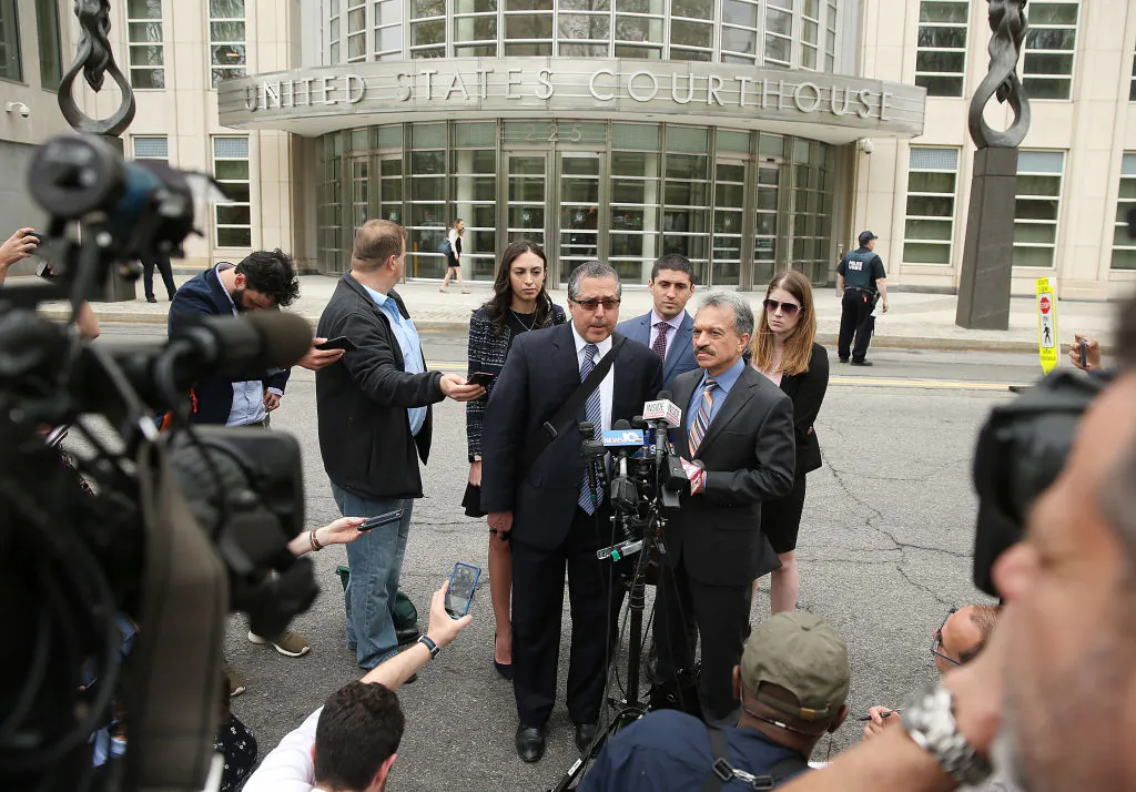 Legal Council representing Keith Raniere and the group NXIVM Mark Agnifilo and Paul DerOhannesian speak to the media outside the U.S. Eastern District Court in relation to sex trafficking charges in Brooklyn, New York City, on May 4, 2018. (Jemal Countess/Getty Images)