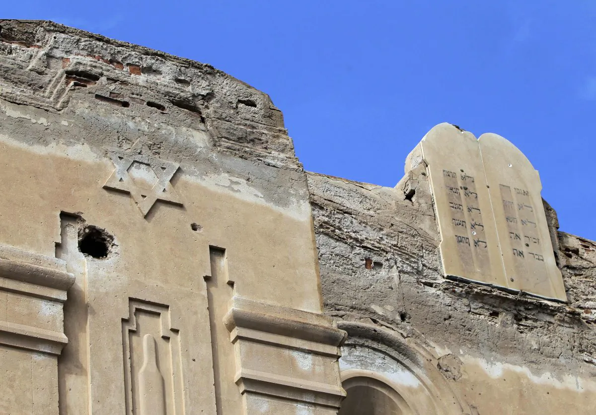 A picture shows the Ten Commandments written in Hebrew on stone tablets on top of the abandoned Dar Bishi synagogue in the Libyan capital Tripoli on Sept. 28, 2011. The Jewish community in Libya dates back to the third century BC and at its peak numbered around 38,000 people, although it was always the smallest of the Jewish populations in north Africa. Most of the Jewish population left in the 20 years following World War II, although several hundred were still living there during ousted leader Moamer Kadhafi's coup of 1969. (Joseph Eid/AFP/Getty Images)