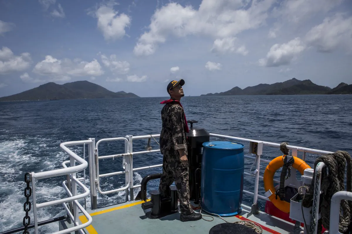 A security ship crew of Ministry of Maritime Affairs and Fisheries prepares to anchor in Natuna during a security patrols along Indonesia's Exclusive Economic Zone (EEZ) in Natuna, Ranai, Indonesia on Aug. 16, 2016. (Ulet Ifansasti/Getty Images)