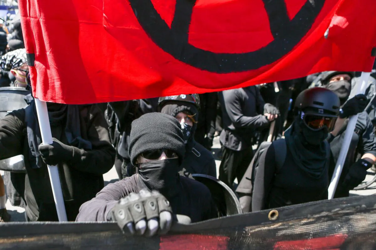 Antifa members and counter protesters gather during a rally at Martin Luther King Jr. Park in Berkeley, Calif., on Aug. 27, 2017. (Amy Osbourne/AFP/Getty Images)