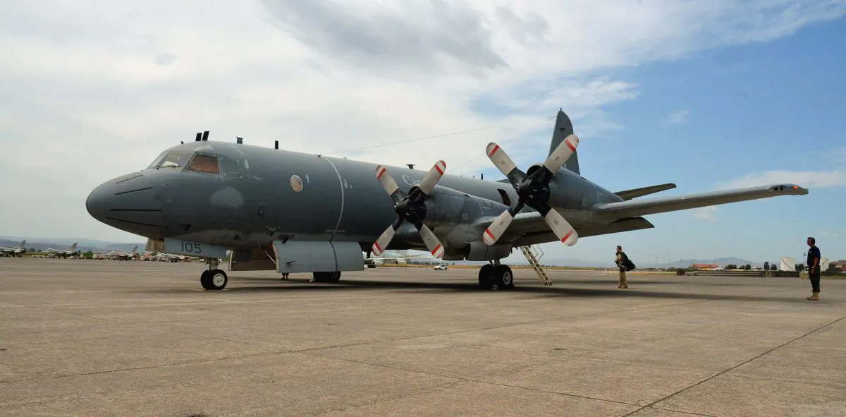 A Canadian CP-140 Aurora on the tarmac at the Italian naval air station in Sigonella, Italy in this undated photo. This same type of plane was treated in an inappropriate manner by Chinese military in October near North Korea. (MThe Canadian Press/Murray Brewster)