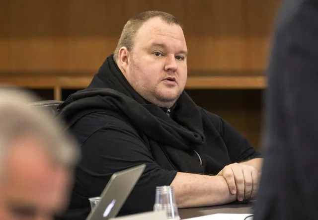 German tech entrepreneur Kim Dotcom sits in a chair during a court hearing in Auckland, New Zealand, Sept. 24, 2015. (Nigel Marple/File Photo/Reuters)