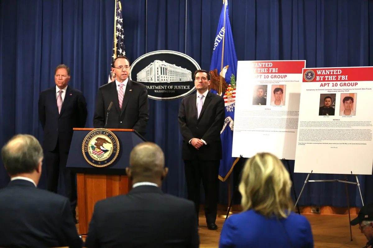 Deputy Attorney General Rod Rosenstein (M), U.S. Attorney for the Southern District of New York Geoffrey Berman (L), Assistant Attorney General for National Security John Demers (R) at the Department of Justice in Washington on Dec. 20, 2018. (Jennifer Zeng/The Epoch Times) 