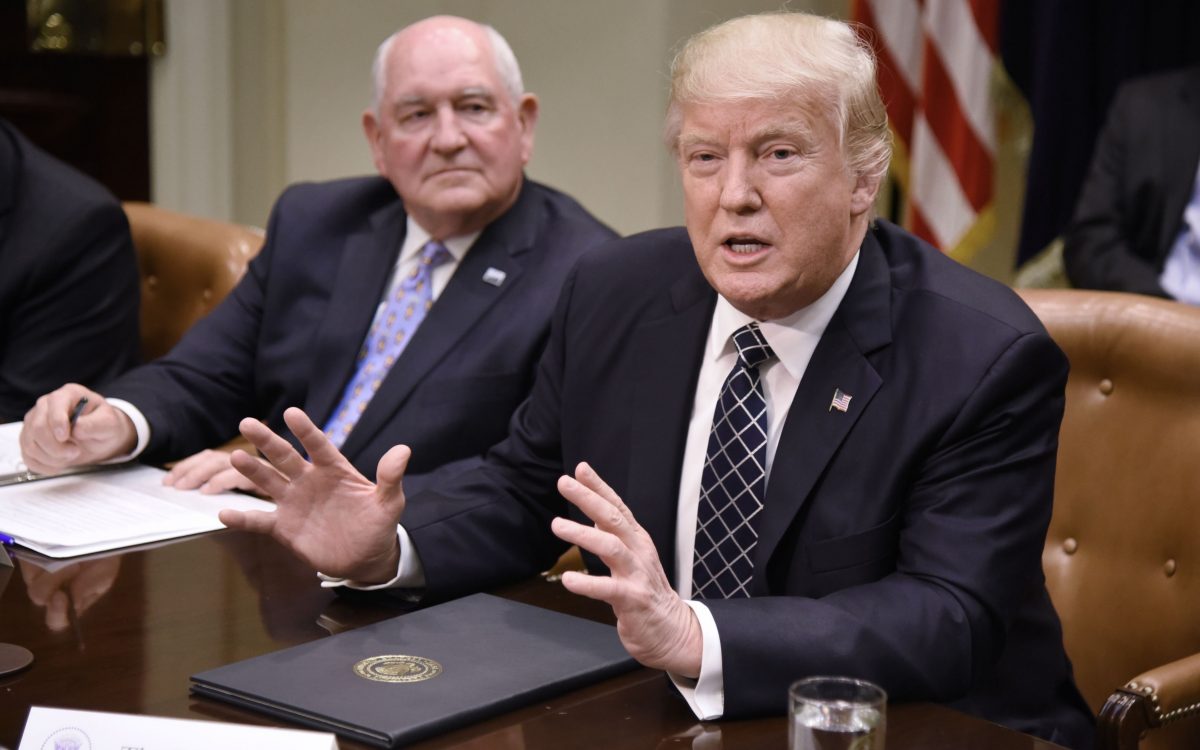 President Donald (R) and Agriculture Secretary Sonny Perdue in the Roosevelt Room of the White House