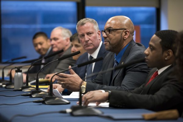 Richards speaking at a forum