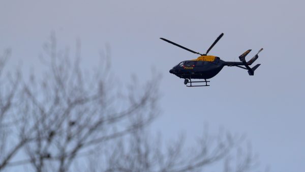 Police helicopter flies over Gatwick