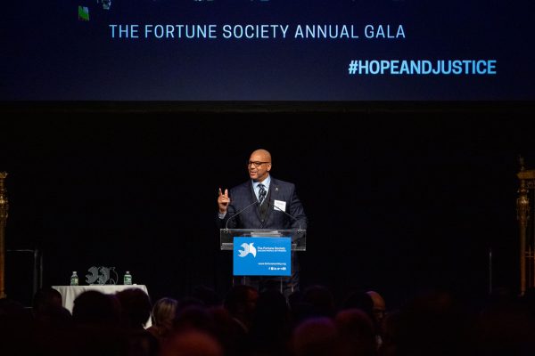 Richards speaks at a gala