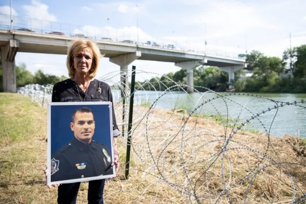 Mary Ann Mendoza, whose son Sgt. Brandon Mendoza was killed by an illegal alien, is next to the Rio Grande, which is the border between the United States and Mexico, in Hidalgo, Texas, on Nov. 5, 2018. (Samira Bouaou/The Epoch Times)