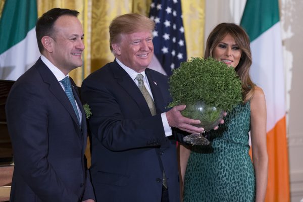 Trump Melania and Prime Minister Leo Varadkar of Ireland during the Shamrock Bowl Presentation.