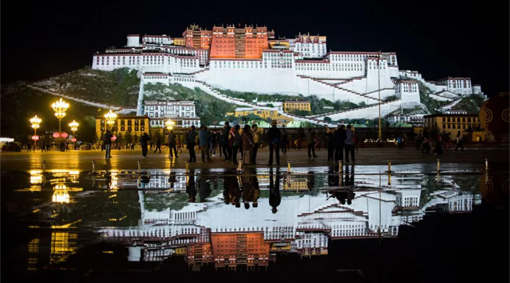 Tourists in front of the iconic Potala Palace in the regional capital Lhasa, in China's Tibet Autonomous Region on Sept. 9, 2016. (Johannes Eisele/AFP/Getty Images)