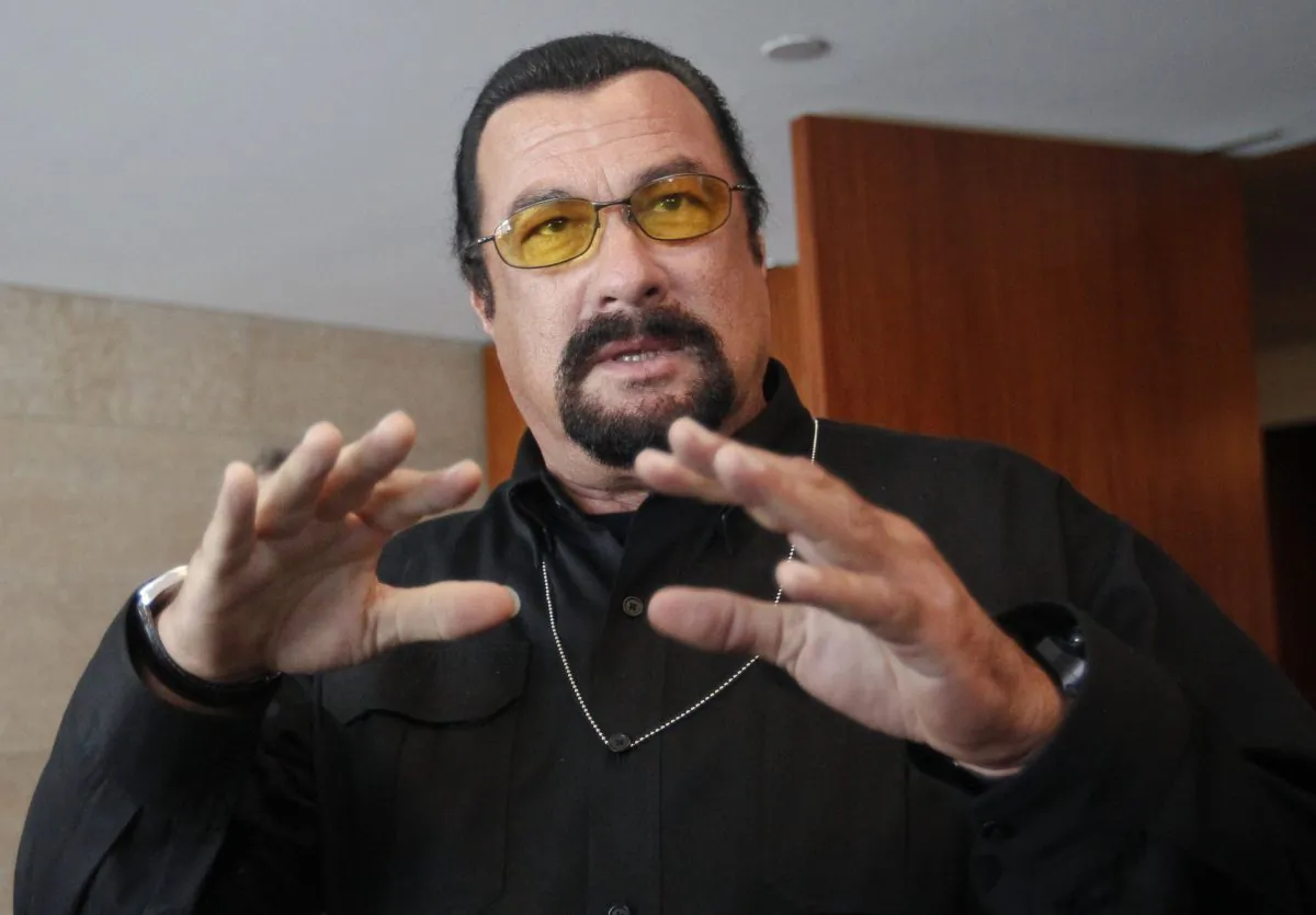 U.S. actor Steven Seagal speaks to the media at a news conference in Moscow June 2, 2013.     (Reuters/Maxim Shemetov)