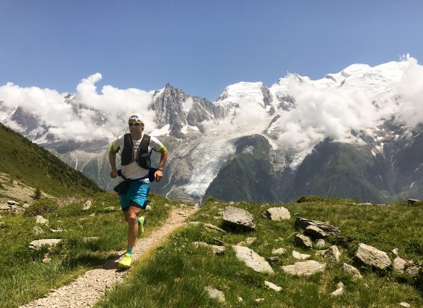 man-runs-on-alpine-trail