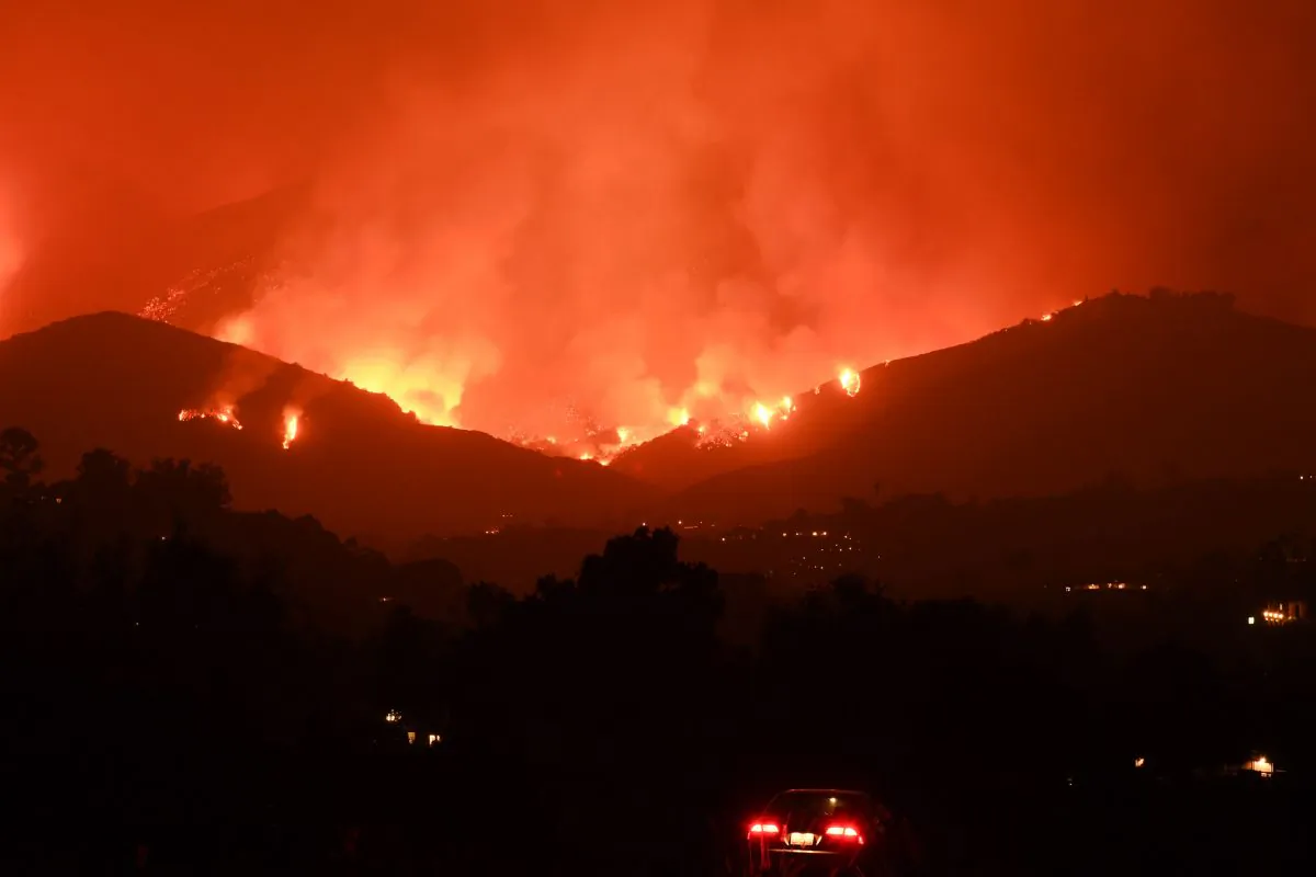 Flames from the Thomas Fire in the hills of Montecito, California, Dec. 11, 2017. (ROBYN BECK/AFP/Getty Images)
