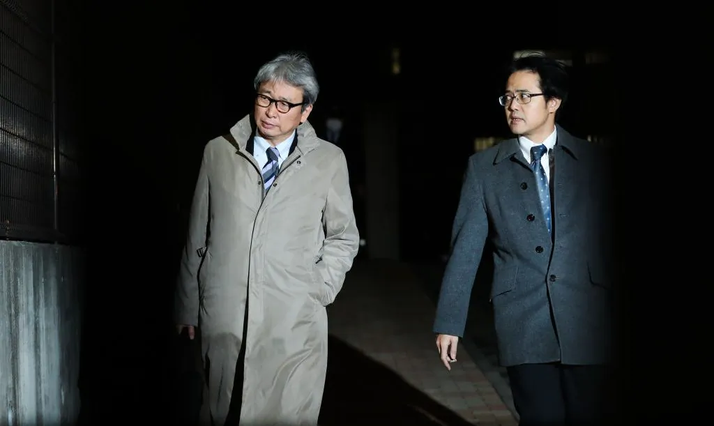 Motonari Otsuru (L) , lawyer for Carlos Ghosn leaves the Tokyo Detention House on Dec. 20, 2018 in Tokyo, Japan. (Takashi Aoyama/Getty Images)