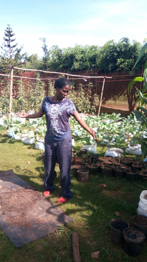 woman is showing her garden