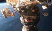 Russian Cosmonauts Take Spacewalk to Probe Mystery of Craft Hole