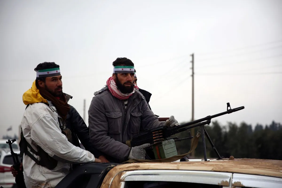 Turkish-backed Syrian fighters leave their barracks in the rebel-held border town of Jarabulus on Dec. 25, 2018, as they prepare to move towards Manbij. (Nazeer Al-Khatib/AFP)