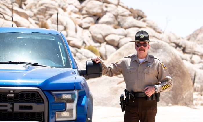Sheriff Leon Wilmot in the desert by the U.S.–Mexico border near Yuma, Ariz., on May 25, 2018. (Samira Bouaou/The Epoch Times)