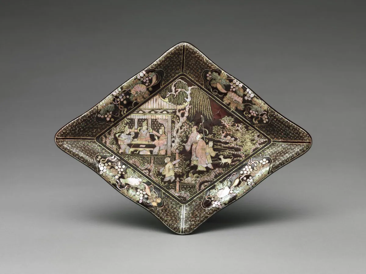 In the late Ming Dynasty, art often depicted Chinese literati enjoying gardens. On this dish, musicians have gathered at a pavilion.Lozenge-shaped dish, Ming Dynasty (1368–1644), dated late 16th–17th century. Rogers Fund, 1923. (The Metropolitan Museum of Art)