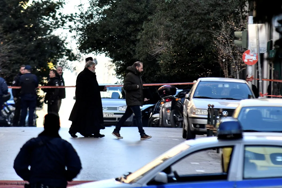 A Greek Orthodox priest arrives at the Saint Dionysios church, following the detonation of an explosive device in Athens on Dec. 27, 2018. (Reuters/Michalis Karagiannis)