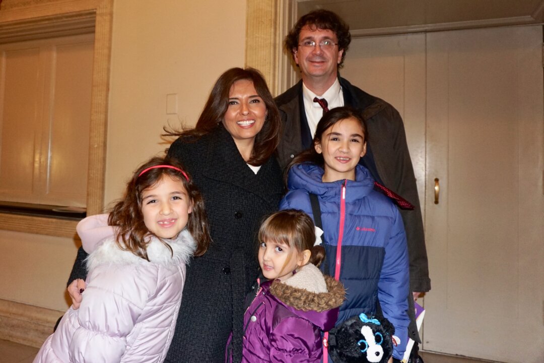 The Portis family at the afternoon performance of Shen Yun Performing Arts at Chicago’s Civic Opera House on Dec. 27, 2018. (Catherine Wen/The Epoch Times)
