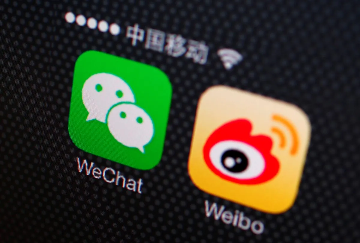 Icons of WeChat and Weibo apps are seen on a smartphone on Dec. 5, 2013. (Petar Kujundzic/Reuters)