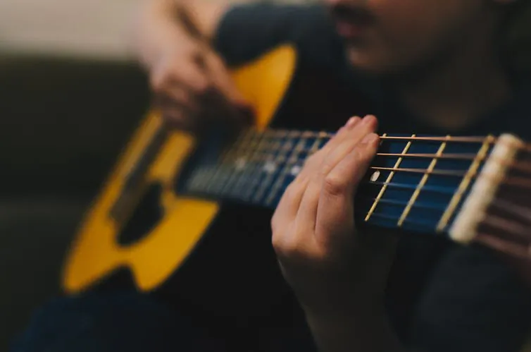 Do you want to learn how to play guitar? Write down why that’s important to you. (Kelly Sikkema/Unsplash)