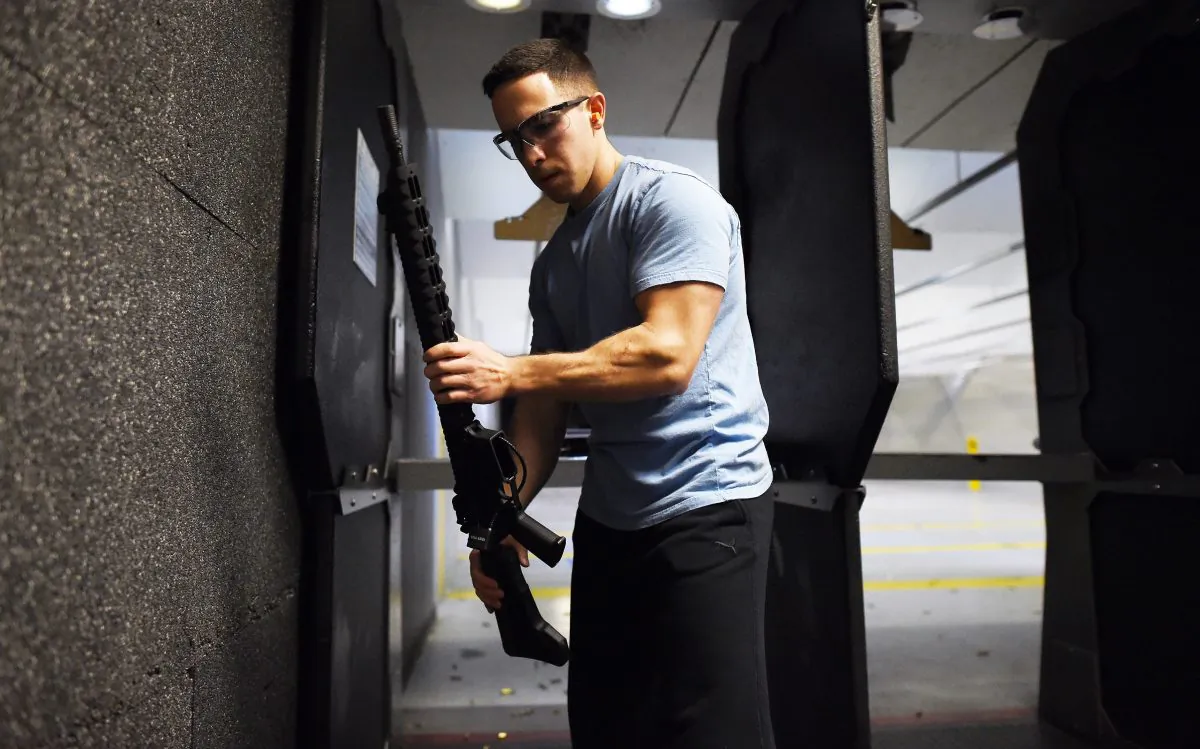A man locks up his gun after a training at the RTSP shooting range in Randolph, N.J., on Dec. 9, 2015. (Jewel Samad/AFP/Getty Images)