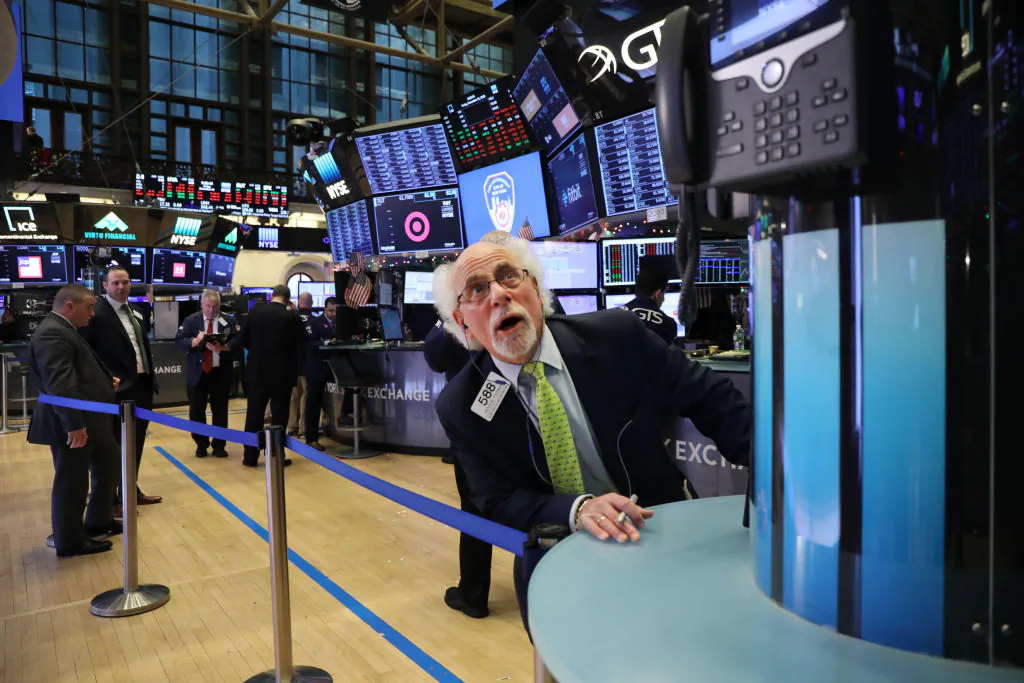 Traders work on the floor of the New York Stock Exchange in New York City, on Dec. 21, 2018. (Spencer Platt/Getty Images)