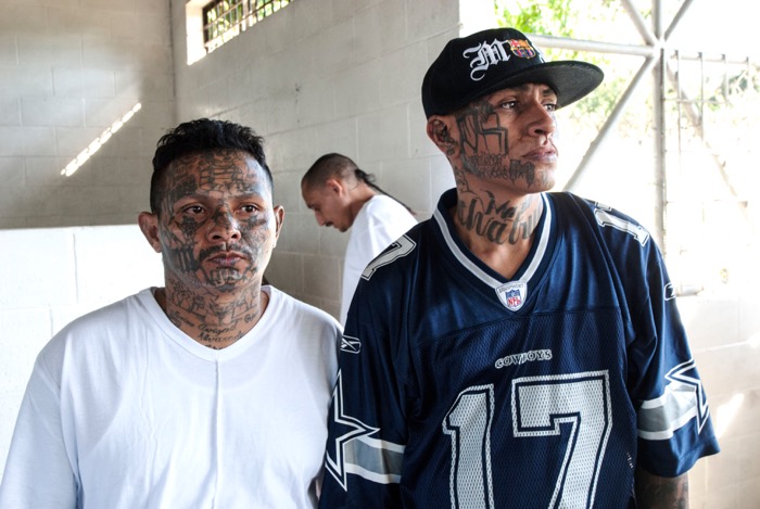 MS-13 gang members attend a conference. 