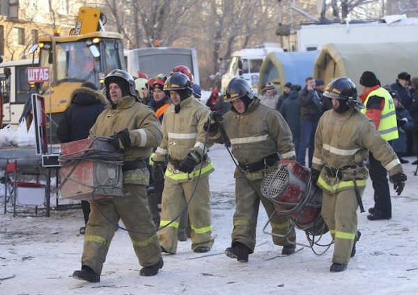 Emergency Situations employees working at the scene of a collapsed apartment building