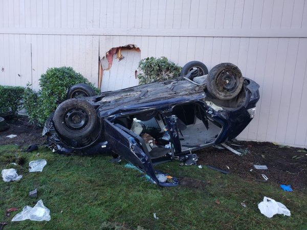 Domestic violence car upside down