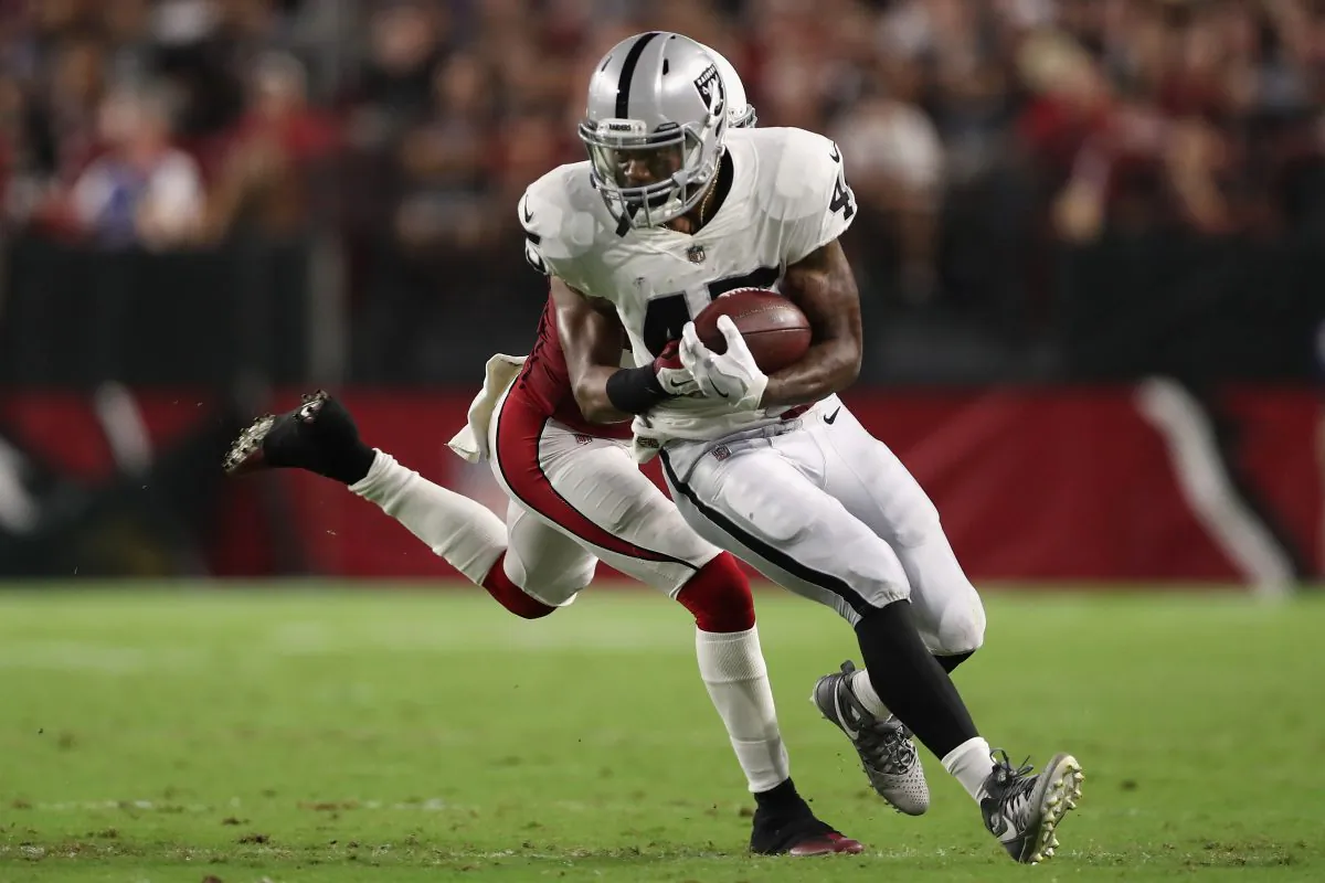 Running back George Atkinson #45 of the Oakland Raiders runs with the football during the NFL game at the University of Phoenix Stadium in Glendale, Arizona, on Aug. 12, 2017. (Christian Petersen/Getty Images)
