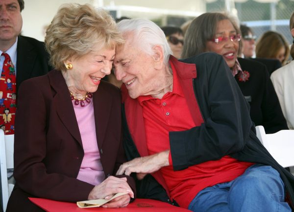 Actor Kirk Douglas and wife Anne Chatting